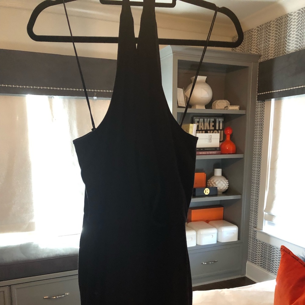Black sleeveless halter top romper.